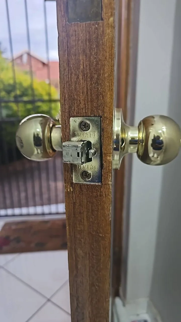 Lever handle lockset installed on a timber front door