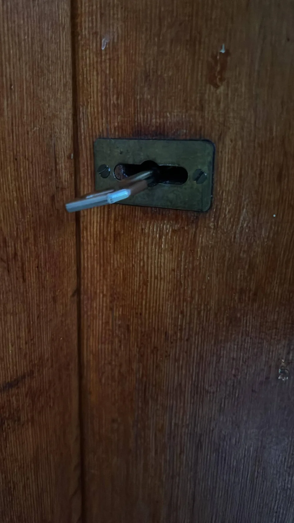 Key turning in a door lock during an emergency lockout callout